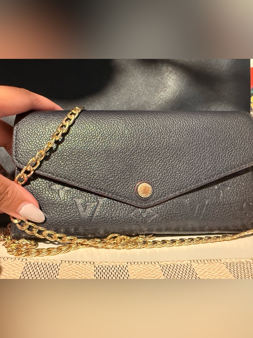 Louis Vuitton empreinte navy leather wallet on chain